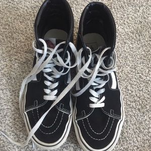 White and Black High Top Vans
